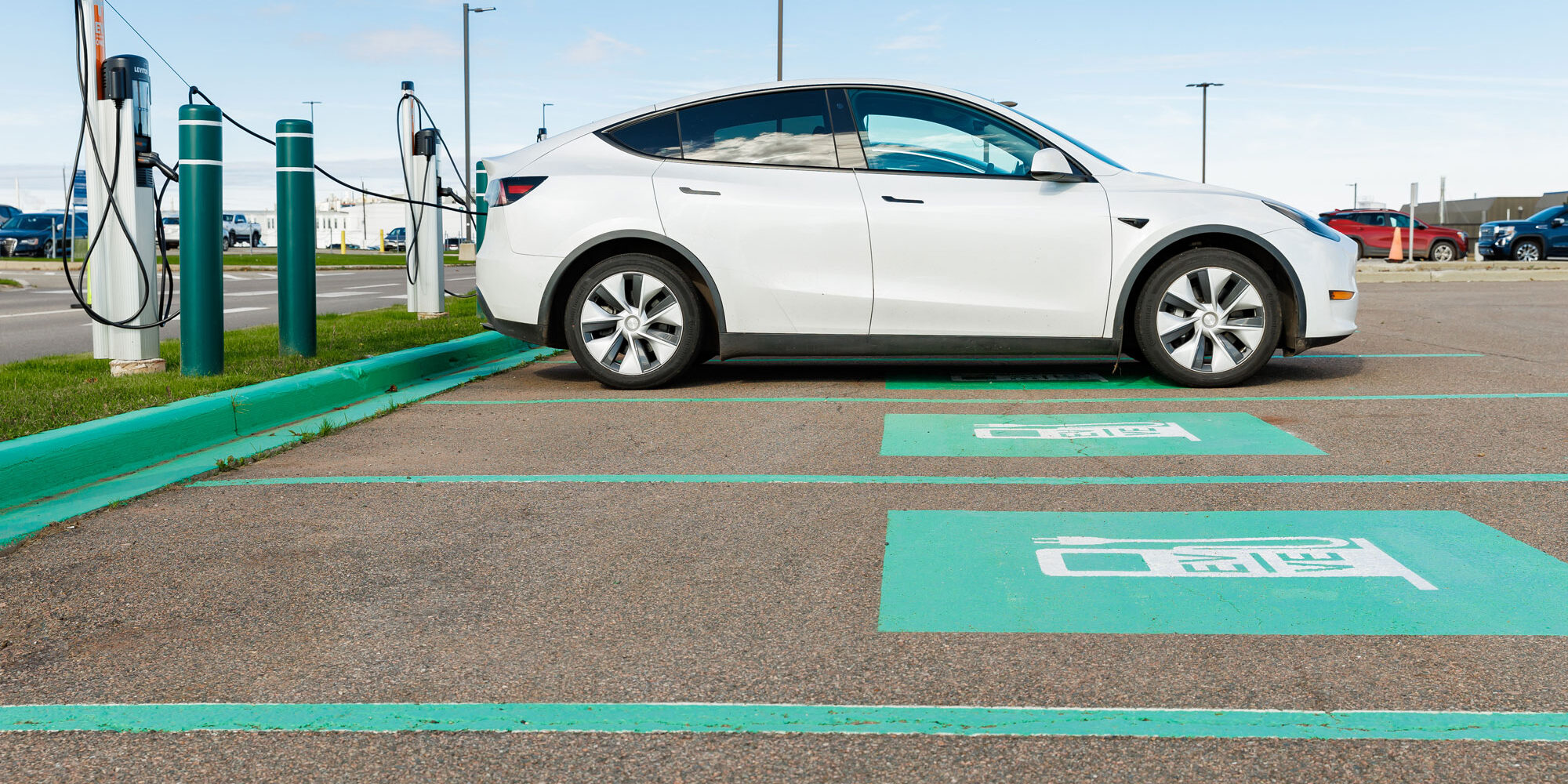 Electric vehicle being charged